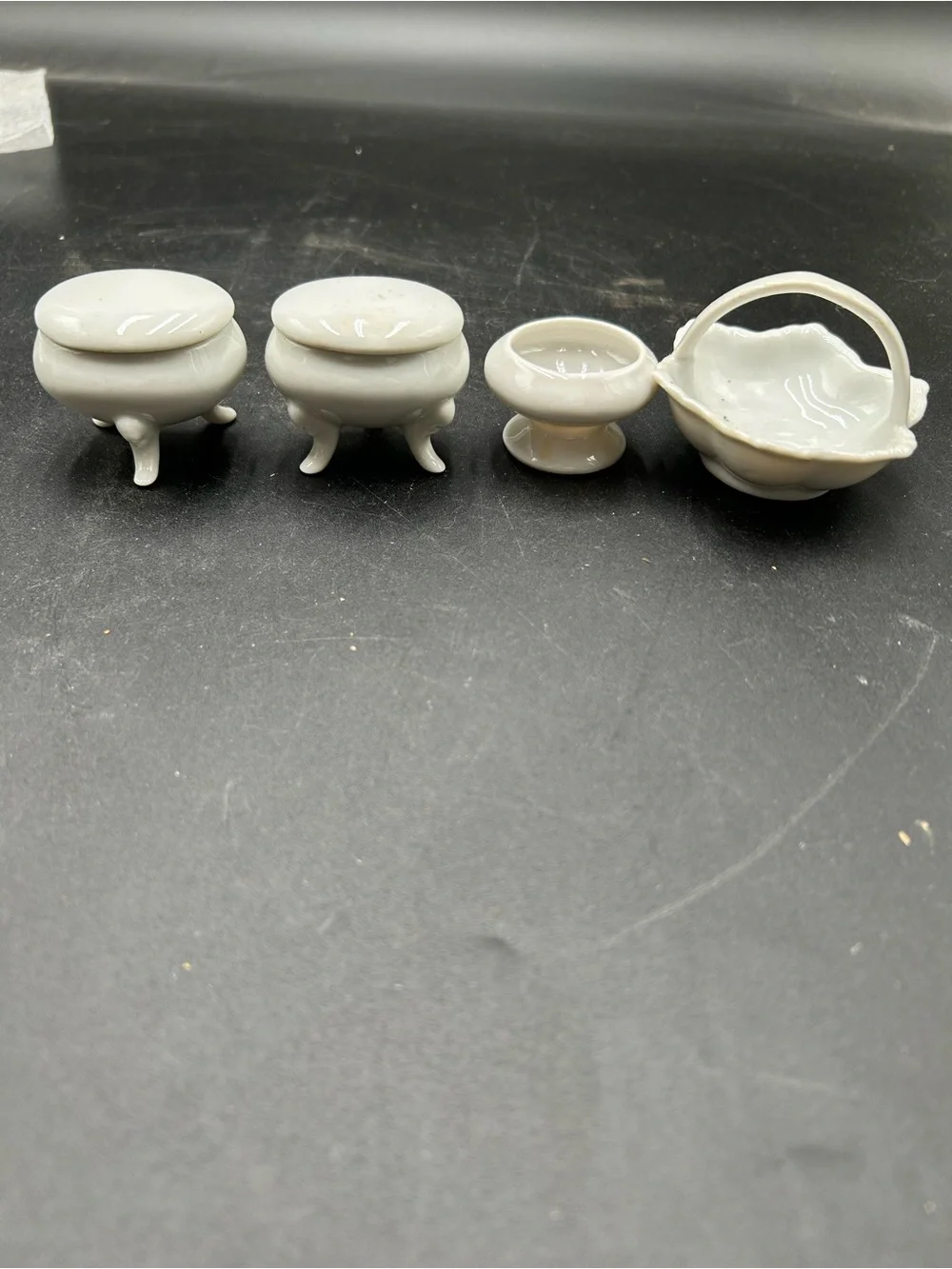 Set of 3 Small White Porcelain Footed Trinket Boxes and A Small White Basket